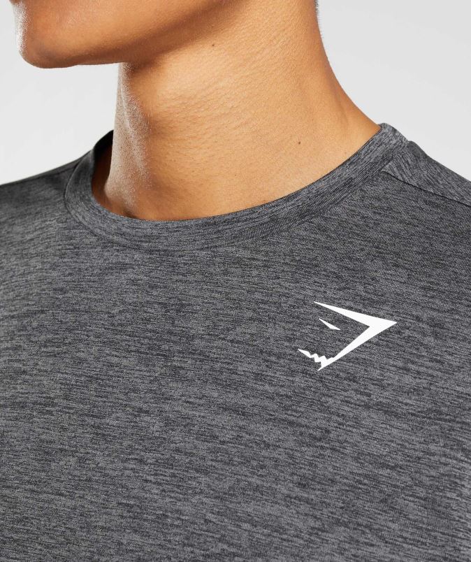 ob prihodu majica z dolgimi rokavi moškiGymshark črna/silhueta sivi lapor J00L2601