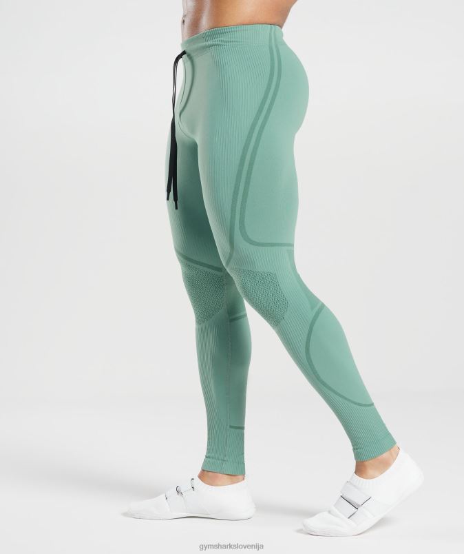 315 brezšivne hlačne nogavice moškiGymshark črnilo modro/draguljasto zelena J00L21030