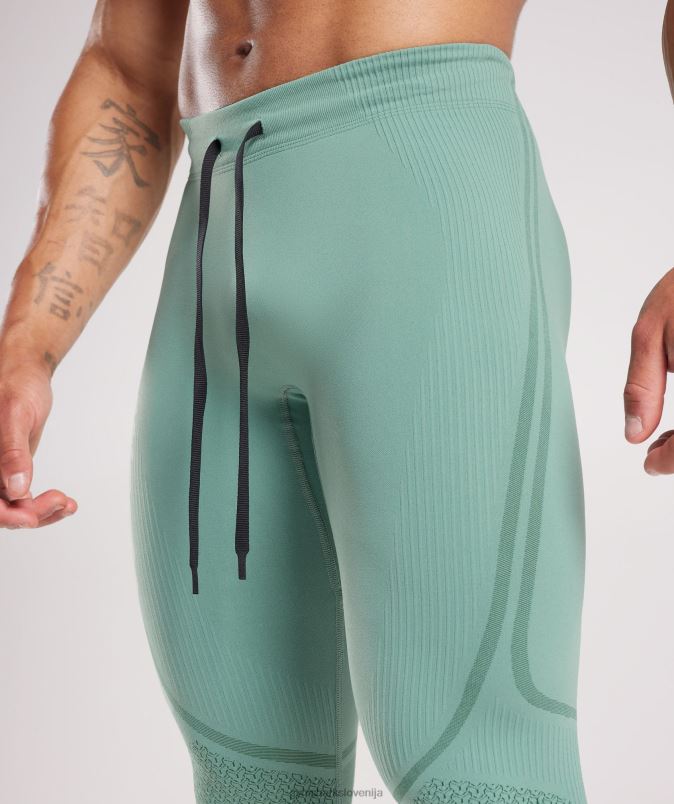 315 brezšivne hlačne nogavice moškiGymshark črnilo modro/draguljasto zelena J00L21030