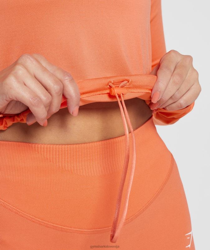 brezšivna majica z dolgimi rokavi ženskeGymshark vesoljska oranžna J00L2456