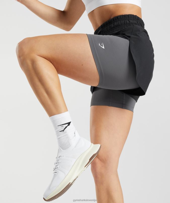 tekaške kratke hlače 2 v 1 ženskeGymshark črna/silhueta siva J00L240