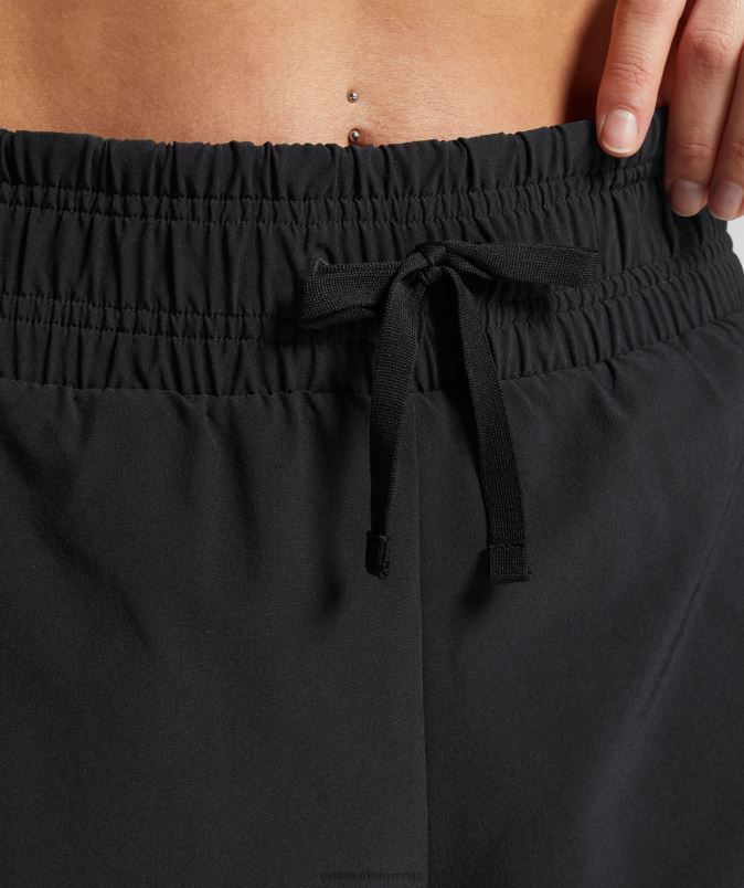 tekaške kratke hlače 2 v 1 ženskeGymshark črna/silhueta siva J00L240