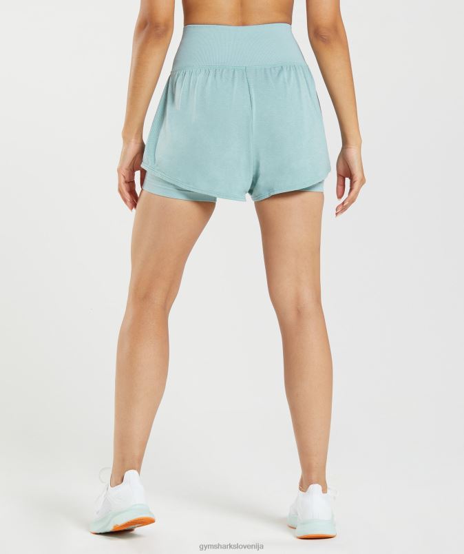 vital brezšivne kratke hlače 2 v 1 2.0 ženskeGymshark biserno modri lapor J00L293