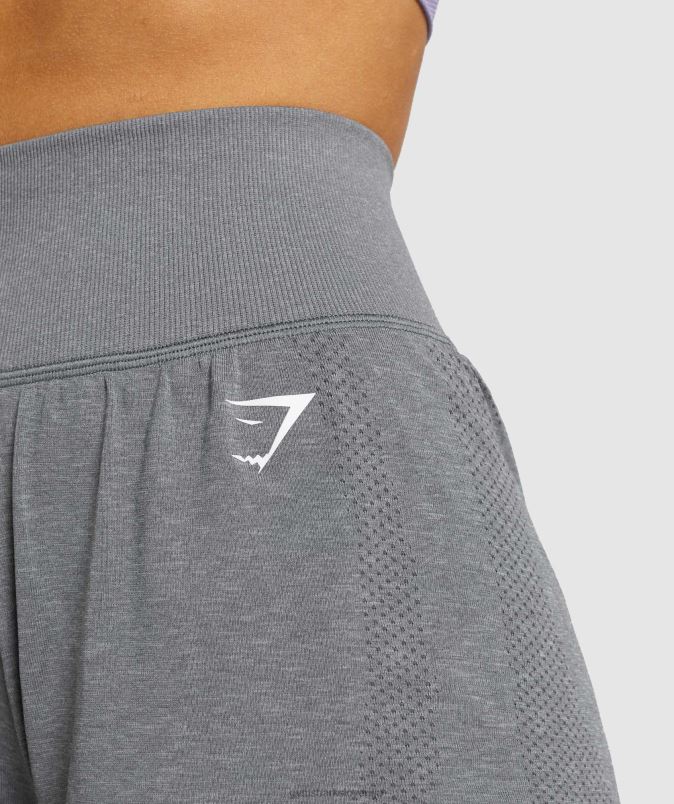 vital brezšivne kratke hlače 2 v 1 2.0 ženskeGymshark dimljeno sivi lapor J00L297