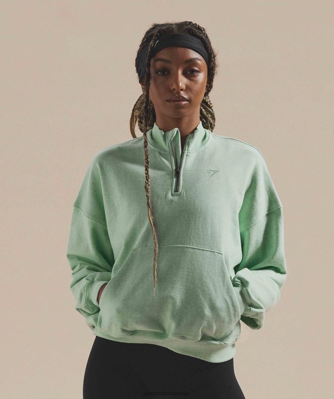 Pulover z zadrgo na dan počitka ženskeGymshark osvežilni zeleni lapor J00L2379