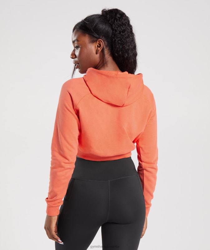 skrajšan pulover s kapuco za trening ženskeGymshark vesoljska oranžna J00L2406